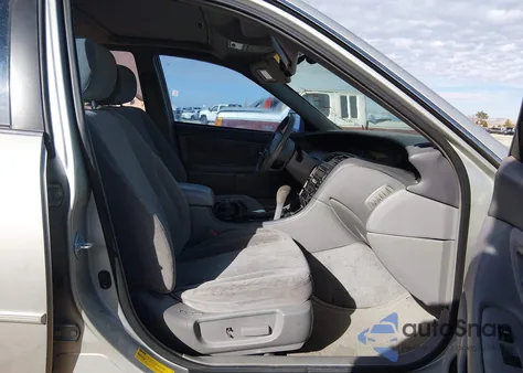 2000 Toyota Avalon Xl z USA, uszkodzony, nr VIN 4T1BF28B3YU020493